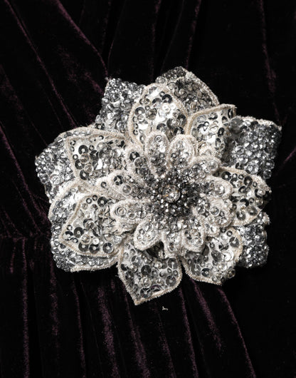 Dolce & Gabbana zwarte fluwelen jurk met bloemenversiering en A-lijn model