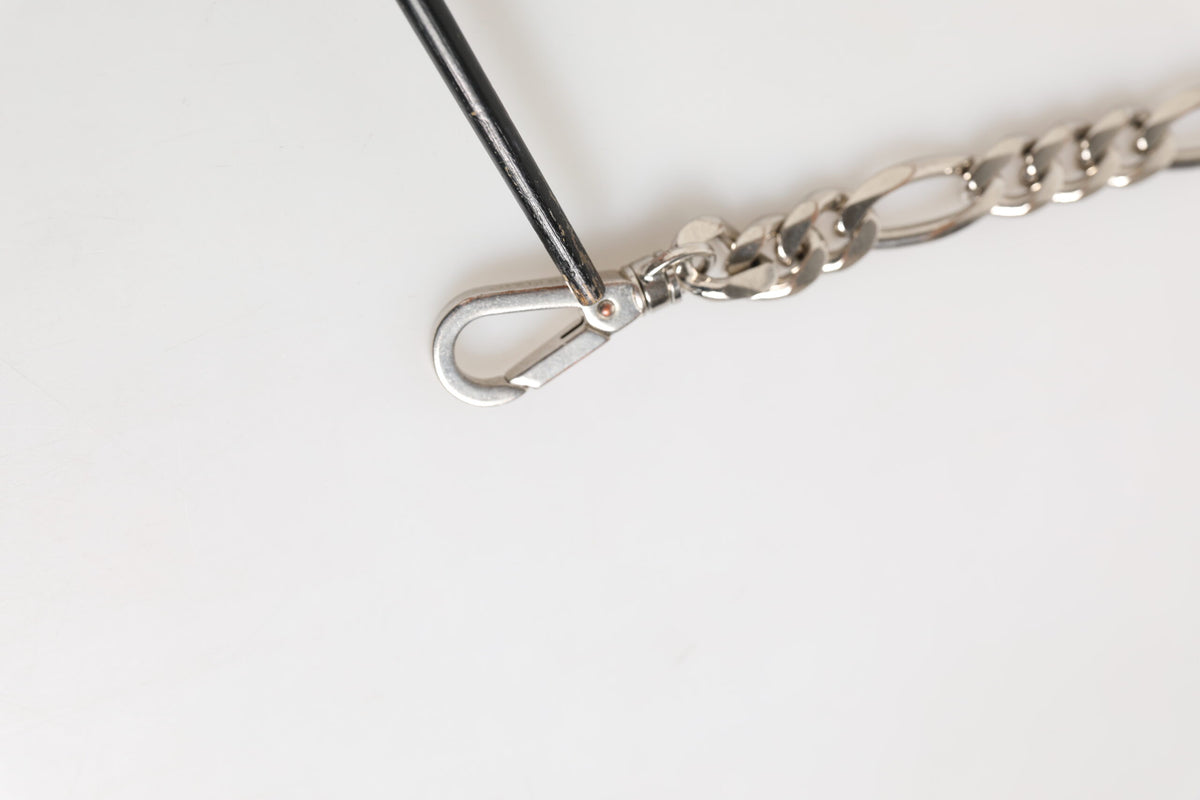 Bracelet Dolce & Gabbana en laiton argenté avec fermoir mousqueton et logo DG