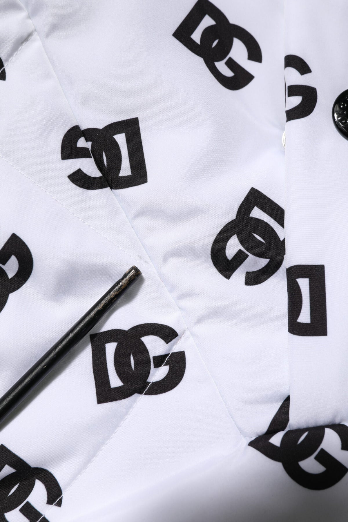 Veste matelassée à capuche blanche avec monogramme DG de Dolce & Gabbana