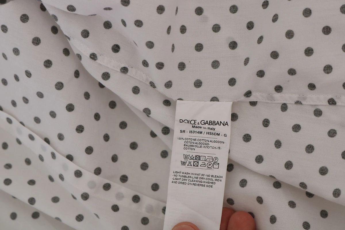 Robe blanche à pois Dolce &amp; Gabbana, chemise formelle Martini.