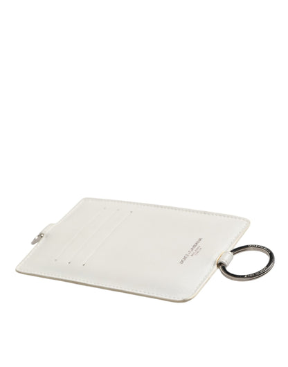 Porte-cartes homme Dolce & Gabbana en cuir de veau blanc avec cordon et logo.