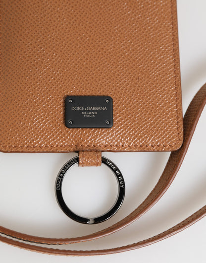 Porte-cartes homme Dolce & Gabbana en cuir marron foncé avec cordon et logo.