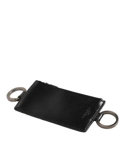 Porte-cartes et portefeuille en cuir noir Dolce & Gabbana avec logo embossé et cordon.