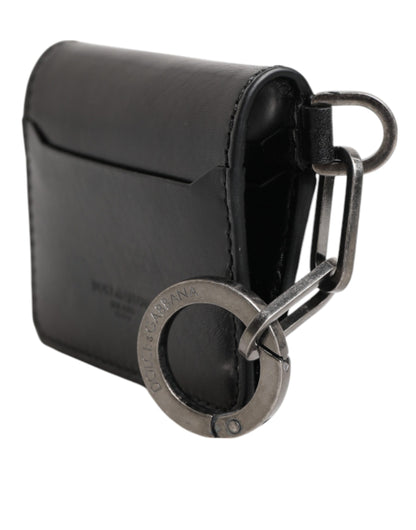 Portefeuille en cuir noir Dolce & Gabbana avec logo en relief, porte-clés et porte-cartes.