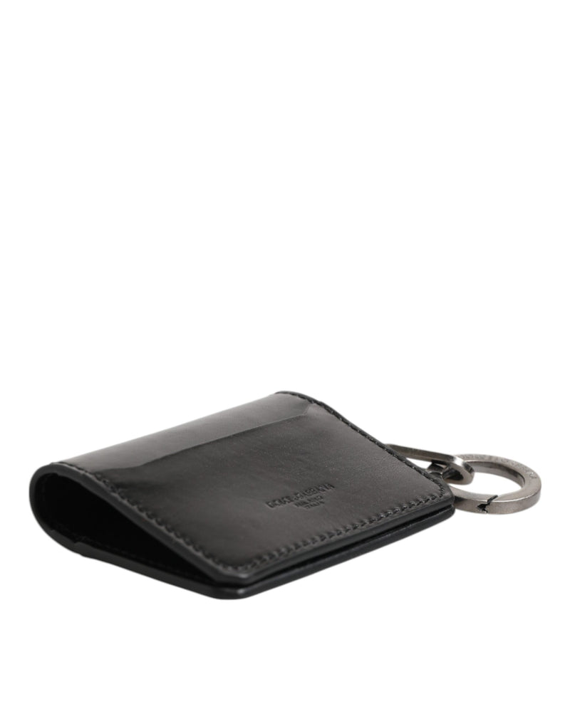 Portefeuille en cuir noir Dolce &amp; Gabbana avec logo en relief, porte-clés et porte-cartes.