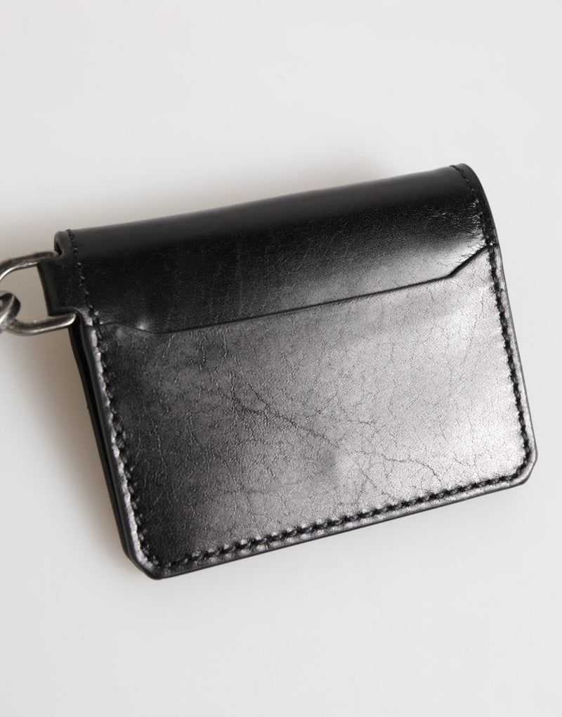 Portefeuille en cuir noir Dolce &amp; Gabbana avec logo en relief, porte-clés et porte-cartes.