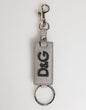 Porte-clés homme Dolce & Gabbana en cuir gris avec anneau métallique et logo.
