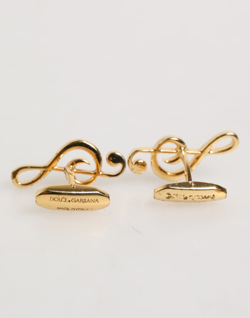 Épingle en laiton doré à motif de note de musique, accessoire pour homme, créateur Dolce &amp; Gabbana.