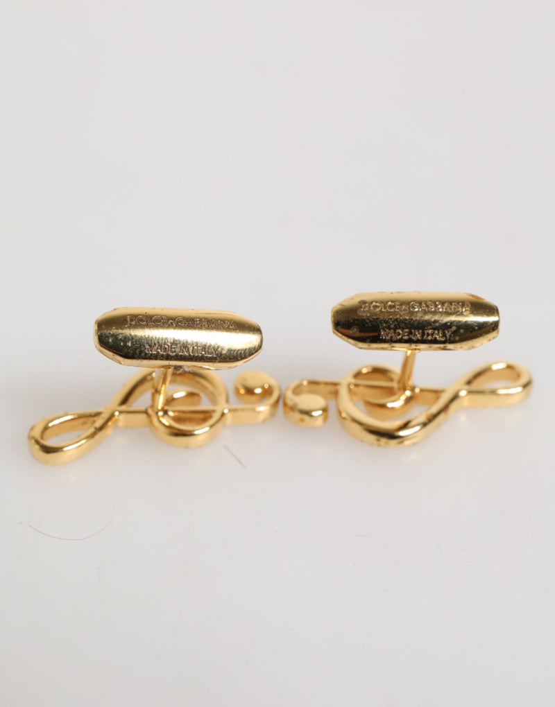 Épingle en laiton doré à motif de note de musique, accessoire pour homme, créateur Dolce &amp; Gabbana.