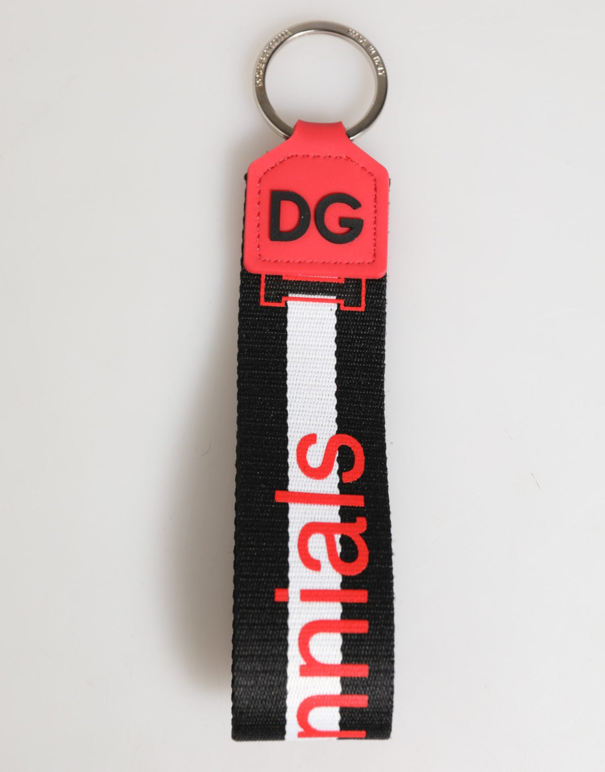 Porte-clés Dolce &amp; Gabbana en polyester et laiton avec logo DG rouge et blanc.