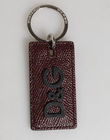 Porte-clés homme Dolce &amp; Gabbana en cuir marron foncé avec logo et anneau en métal.