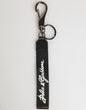 Porte-clés pour homme Dolce &amp; Gabbana en polyester noir et blanc avec logo DG argenté.