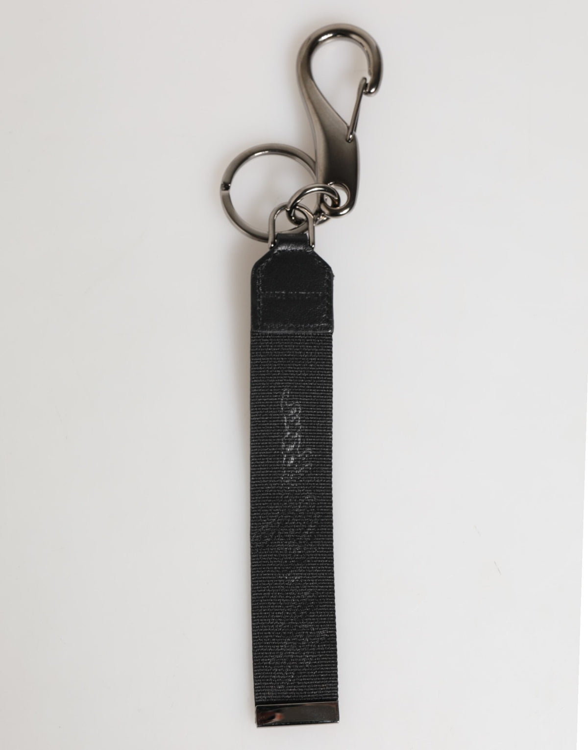 Porte-clés pour homme Dolce &amp; Gabbana en polyester noir et blanc avec logo DG argenté.