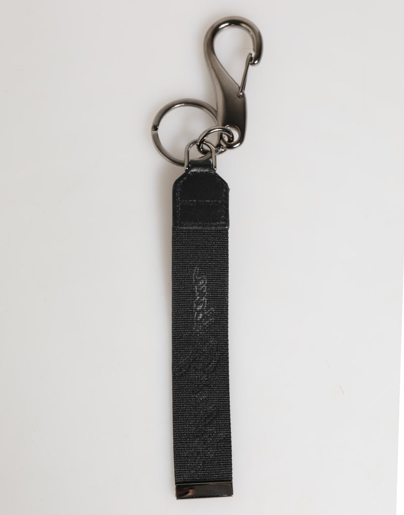 Dolce &amp; Gabbana zwarte en witte polyester sleutelhanger met DG-logo en zilveren details voor heren.