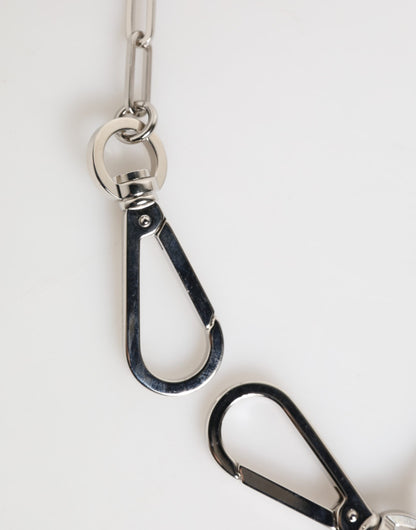 Collier homme Dolce &amp; Gabbana avec pendentif logo DG en chaîne métallique argentée.