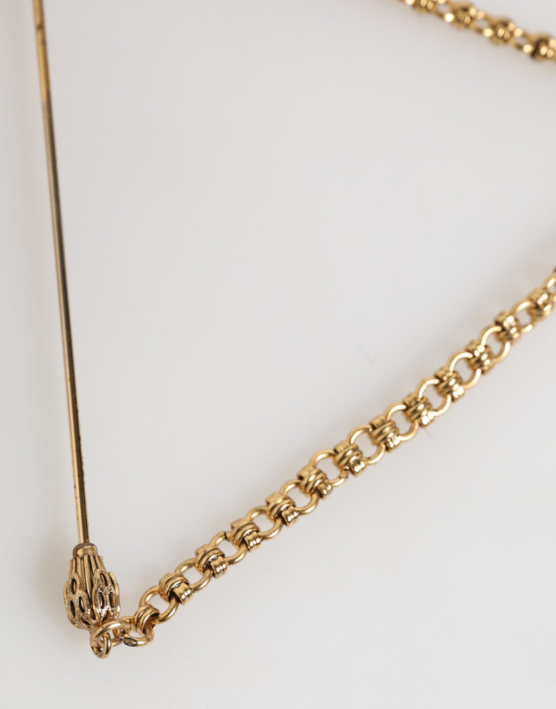 Broche accessoire homme Dolce & Gabbana, épingle de revers en laiton et cuivre, revolver.