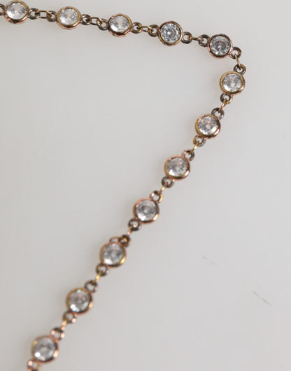 Broche pour homme Dolce &amp; Gabbana, épingle de revers avec logo DG et chaîne dorée.