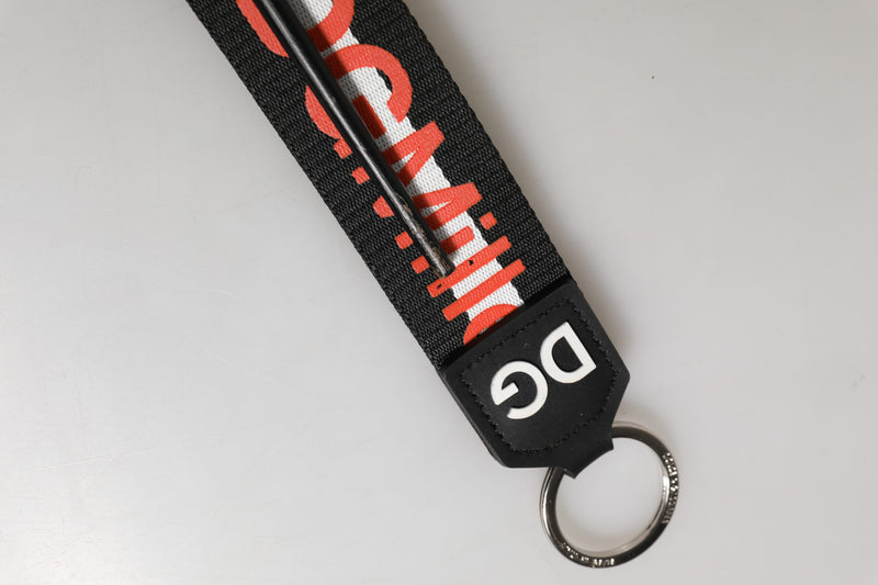 Dolce &amp; Gabbana zwarte en rode logo polyester sleutelhanger met messing hanger