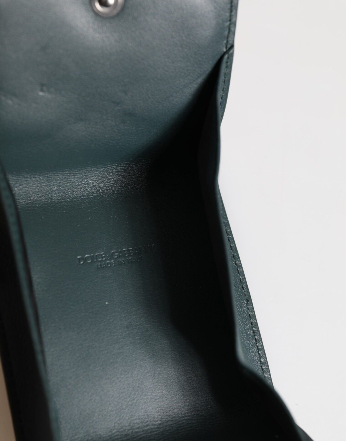 Porte-monnaie Dolce &amp; Gabbana en cuir vert foncé avec logo DG, à accrocher sur un sac.