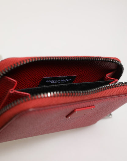 Portefeuille homme en cuir rouge Dolce &amp; Gabbana avec fermeture éclair et plaque logo.