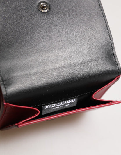 Porte-cartes à trois volets en cuir rouge pour homme avec imprimé du logo Dolce &amp; Gabbana.