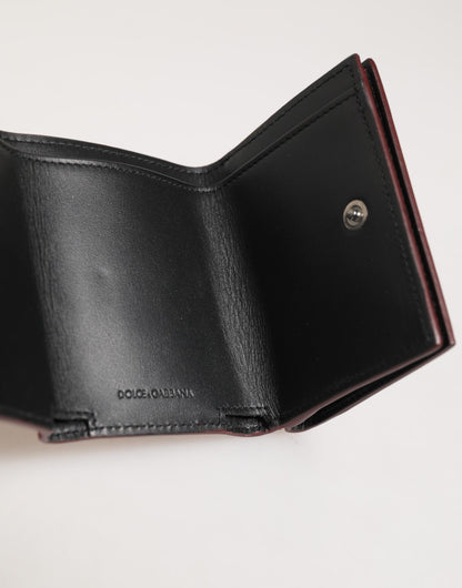Porte-cartes à trois volets en cuir rouge pour homme avec imprimé du logo Dolce &amp; Gabbana.