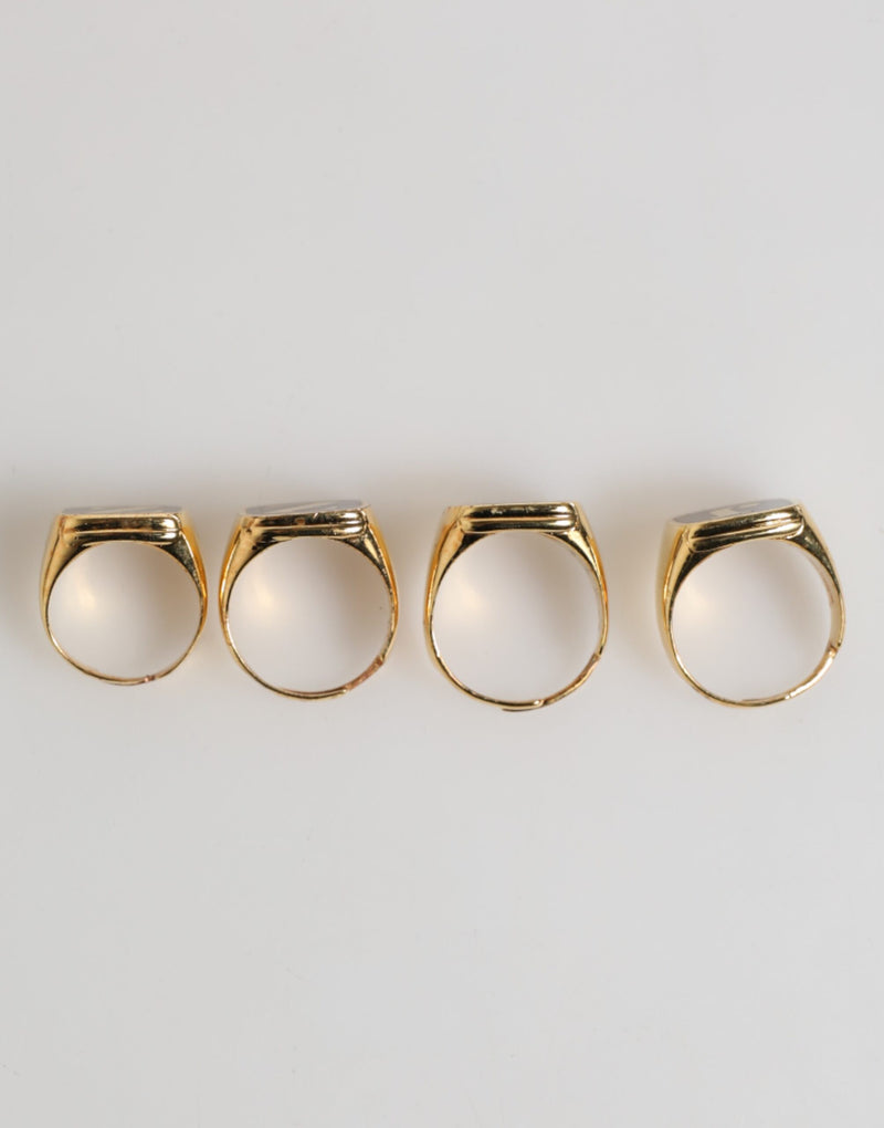 Dolce & Gabbana Gouden JAZZ Letterset van Messing, 4 stuks, Verstelbare Ring