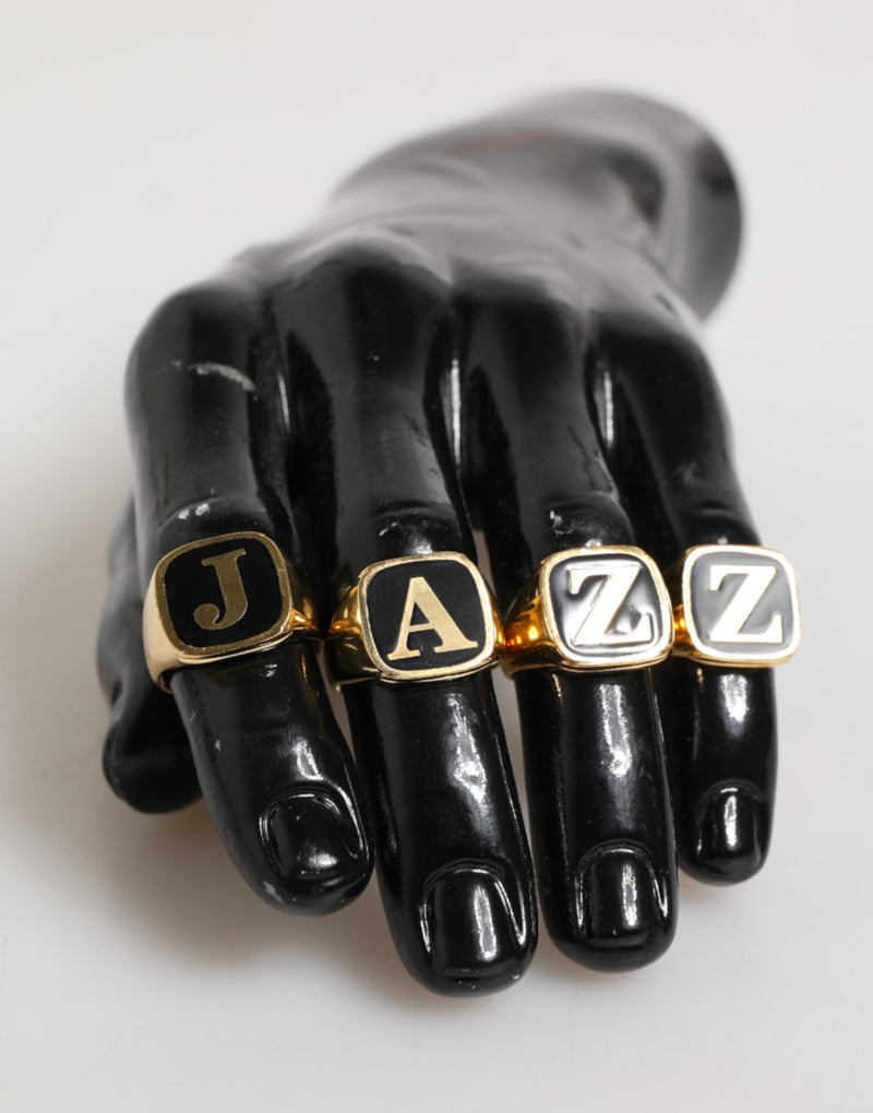 Dolce & Gabbana Gouden JAZZ Letterset van Messing, 4 stuks, Verstelbare Ring
