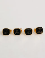 Ensemble de 4 bagues réglables Dolce & Gabbana en laiton doré, avec inscription JAZZ.