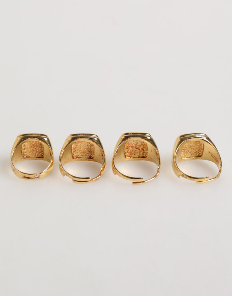Dolce & Gabbana Gouden JAZZ Letterset van Messing, 4 stuks, Verstelbare Ring