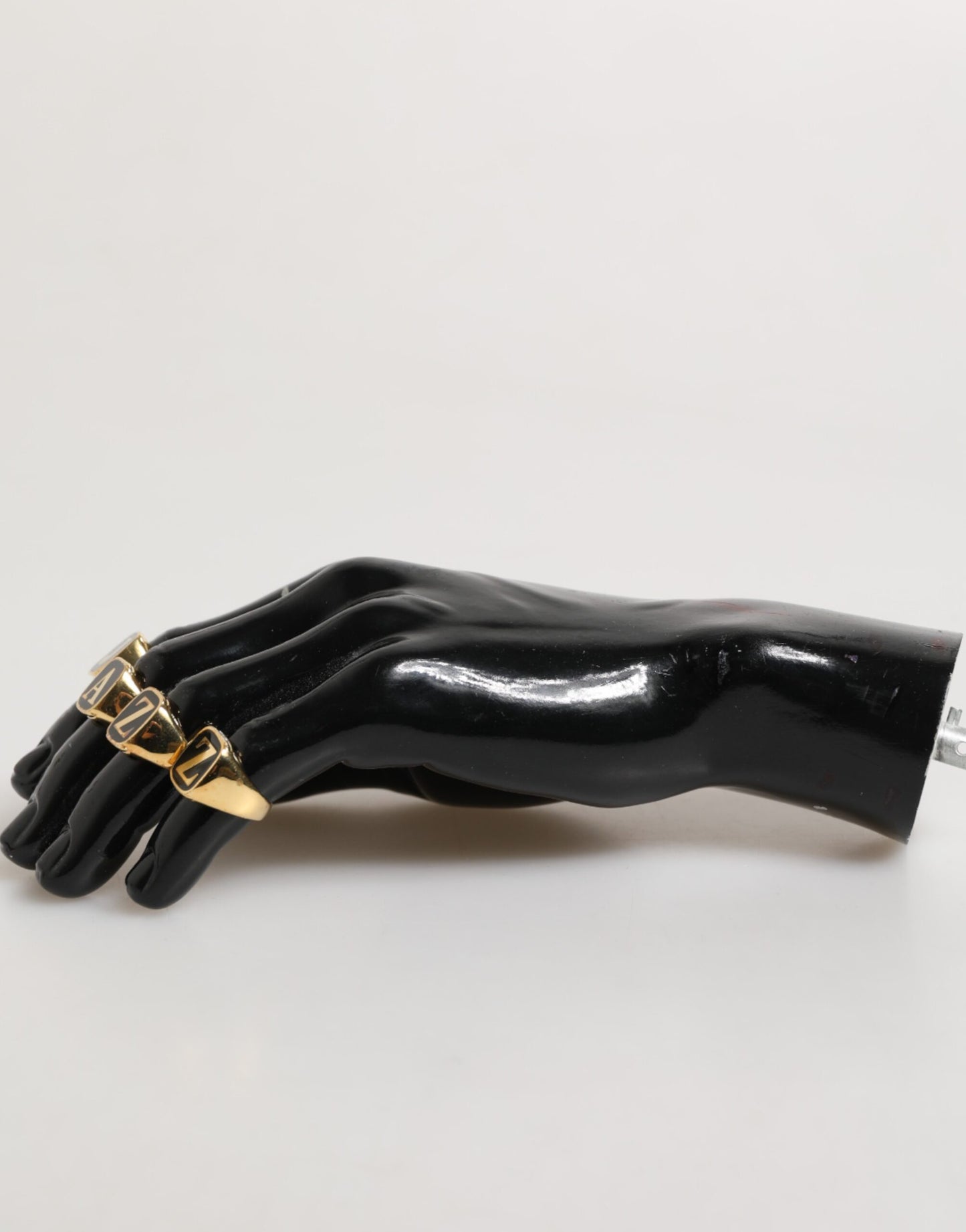 Ensemble de 4 bagues réglables Dolce &amp; Gabbana en laiton doré, avec inscription JAZZ.