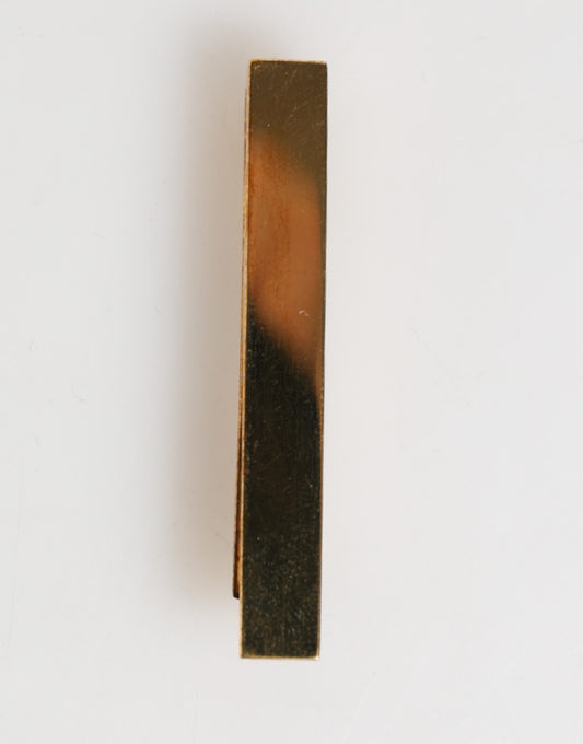 Barrette de cravate pour homme en laiton doré, logo Dolce &amp; Gabbana.