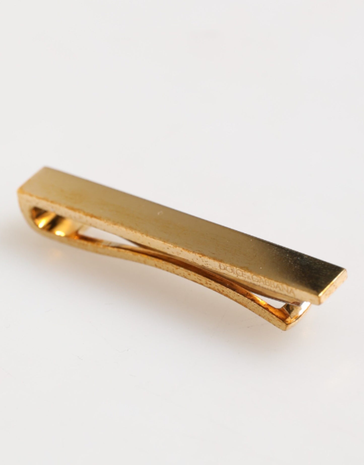Barrette de cravate pour homme en laiton doré, logo Dolce &amp; Gabbana.