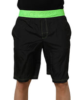 Short de bain noir et vert à logo Dolce &amp; Gabbana avec ceinture.
