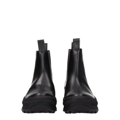 Bottes de cheville en cuir noir Jil Sander