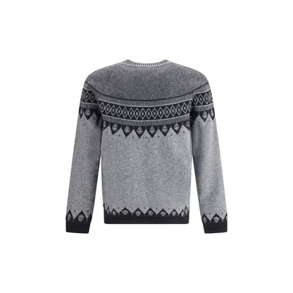 Pull en jacquard à motifs de têtes de mort Alexander McQueen