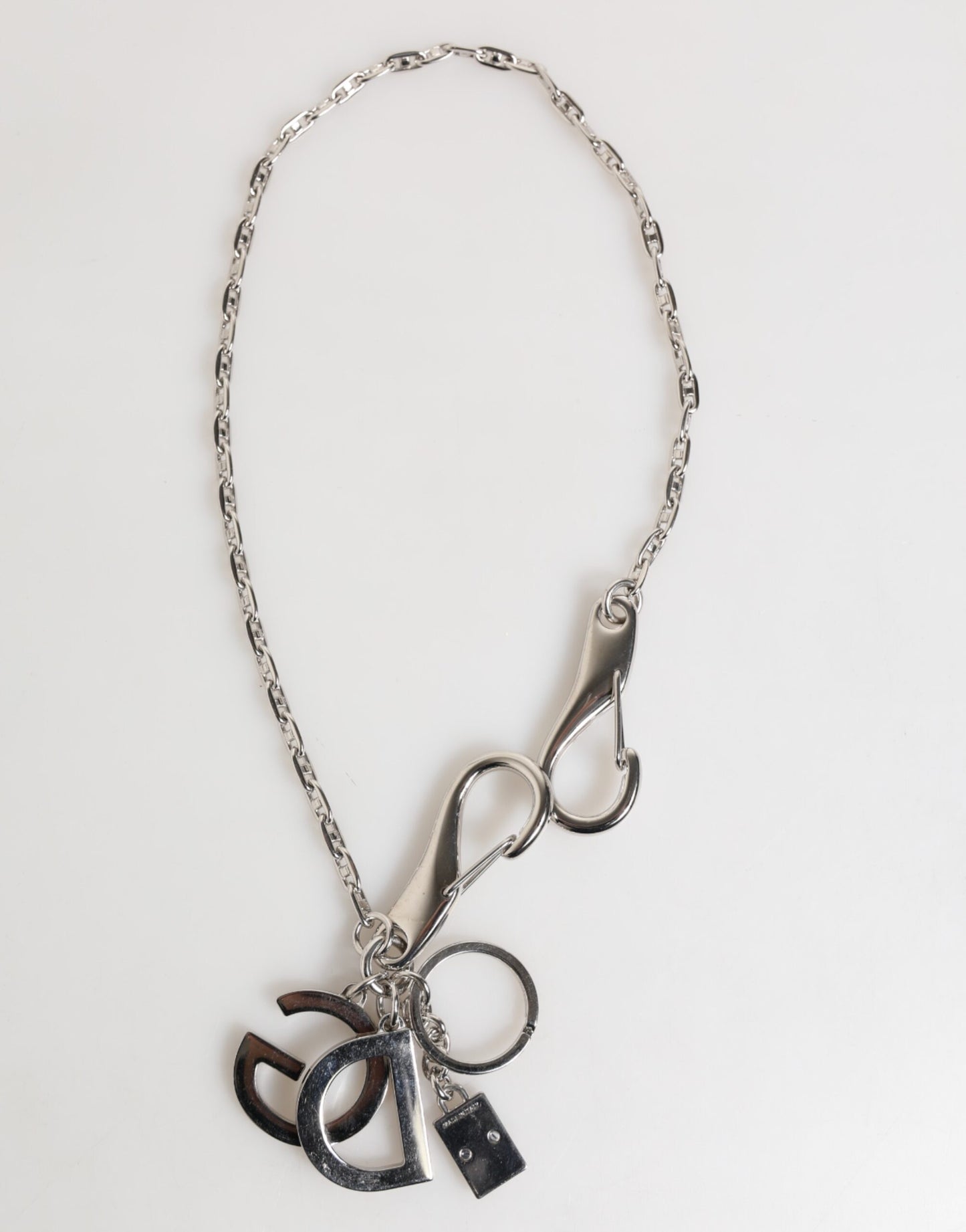 Porte-clés Dolce & Gabbana avec logo DG argenté, breloque pour sac.