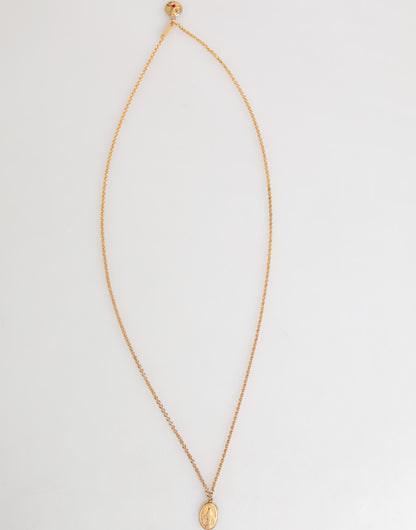 Pendentif collier homme Dolce &amp; Gabbana, médaille dorée sur chaîne en métal.