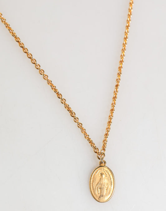 Pendentif collier homme Dolce &amp; Gabbana, médaille dorée sur chaîne en métal.