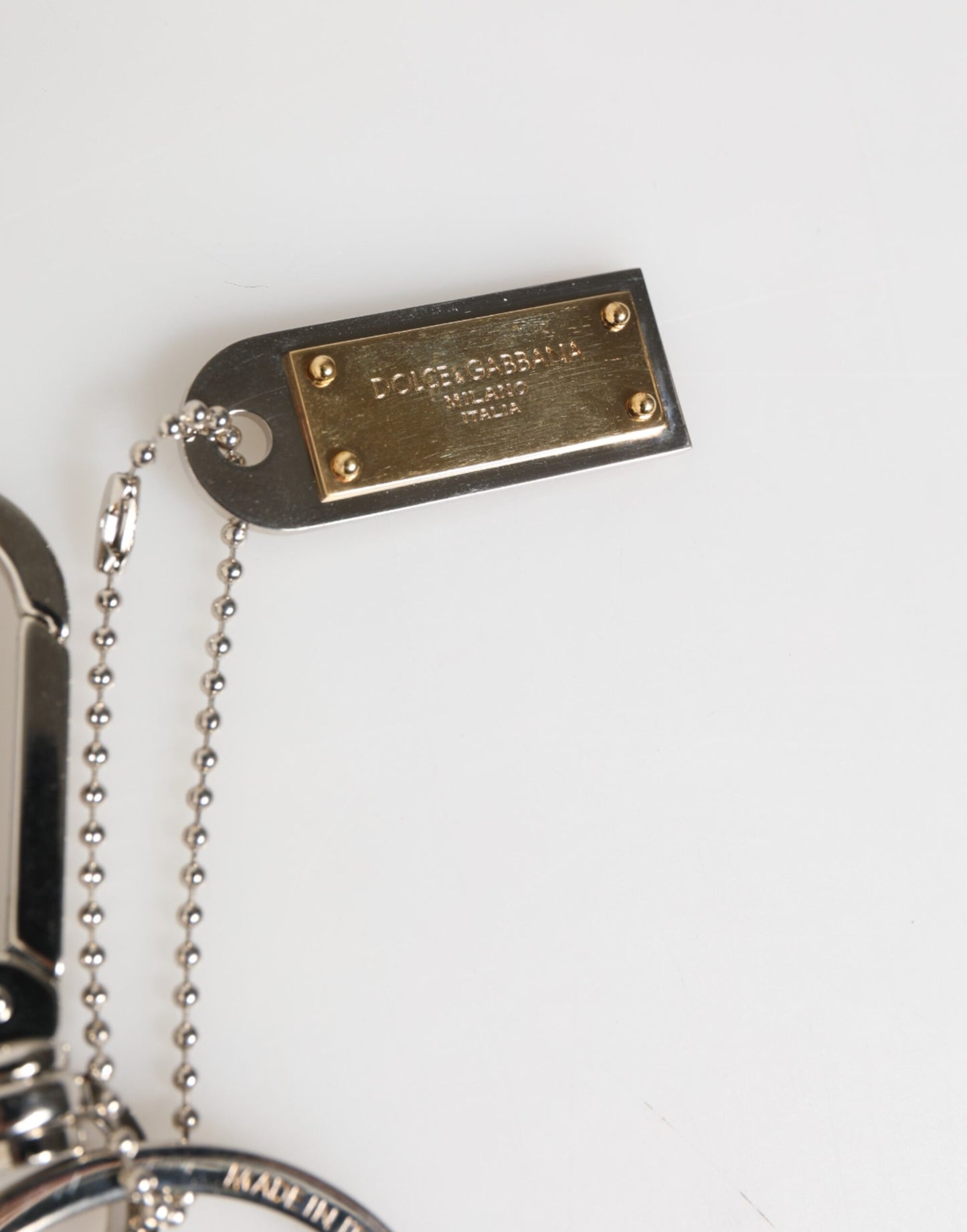 Porte-clés Dolce & Gabbana avec logo DG argenté, breloque pour sac.