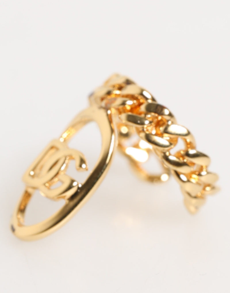 Bague réglable Dolce & Gabbana en laiton doré, avec chaîne et logo DG ovale.