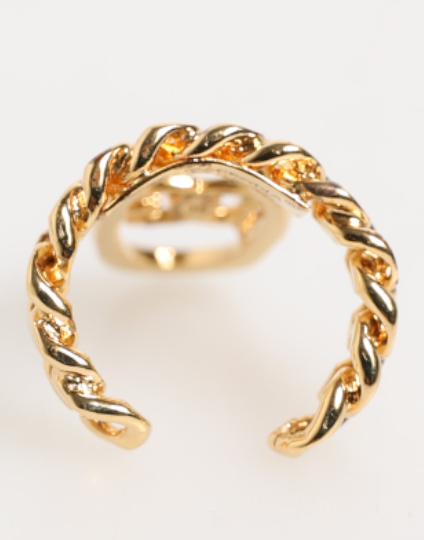 Bague réglable Dolce &amp; Gabbana en laiton doré, avec chaîne et logo DG ovale.
