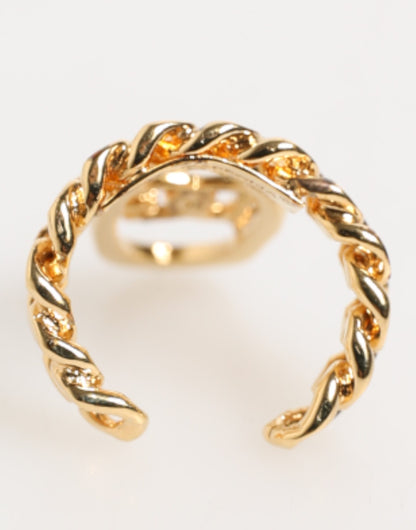 Bague réglable Dolce &amp; Gabbana en laiton doré, avec chaîne et logo DG ovale.
