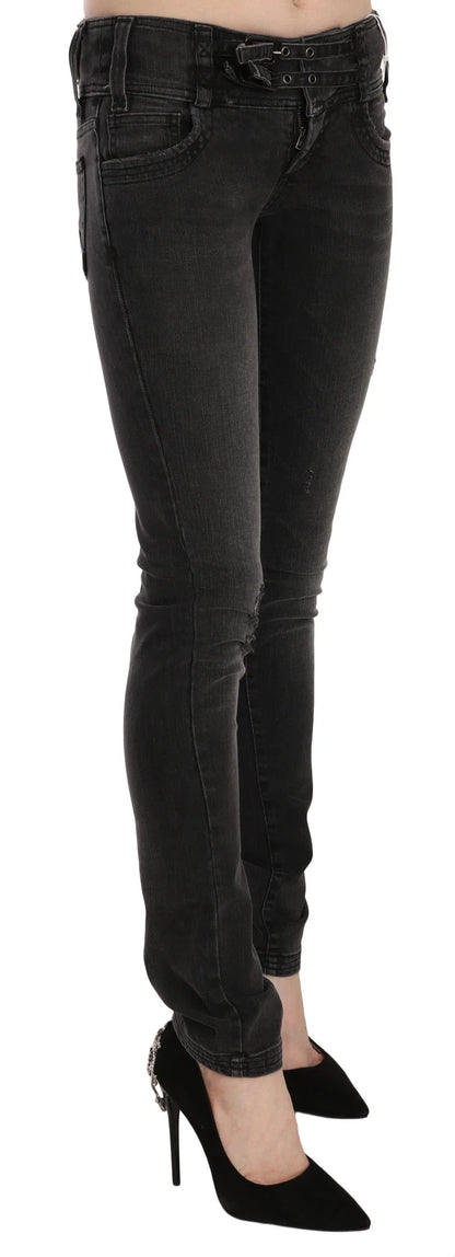 Jean skinny noir délavé, taille basse et coupe ajustée de John Galliano.
