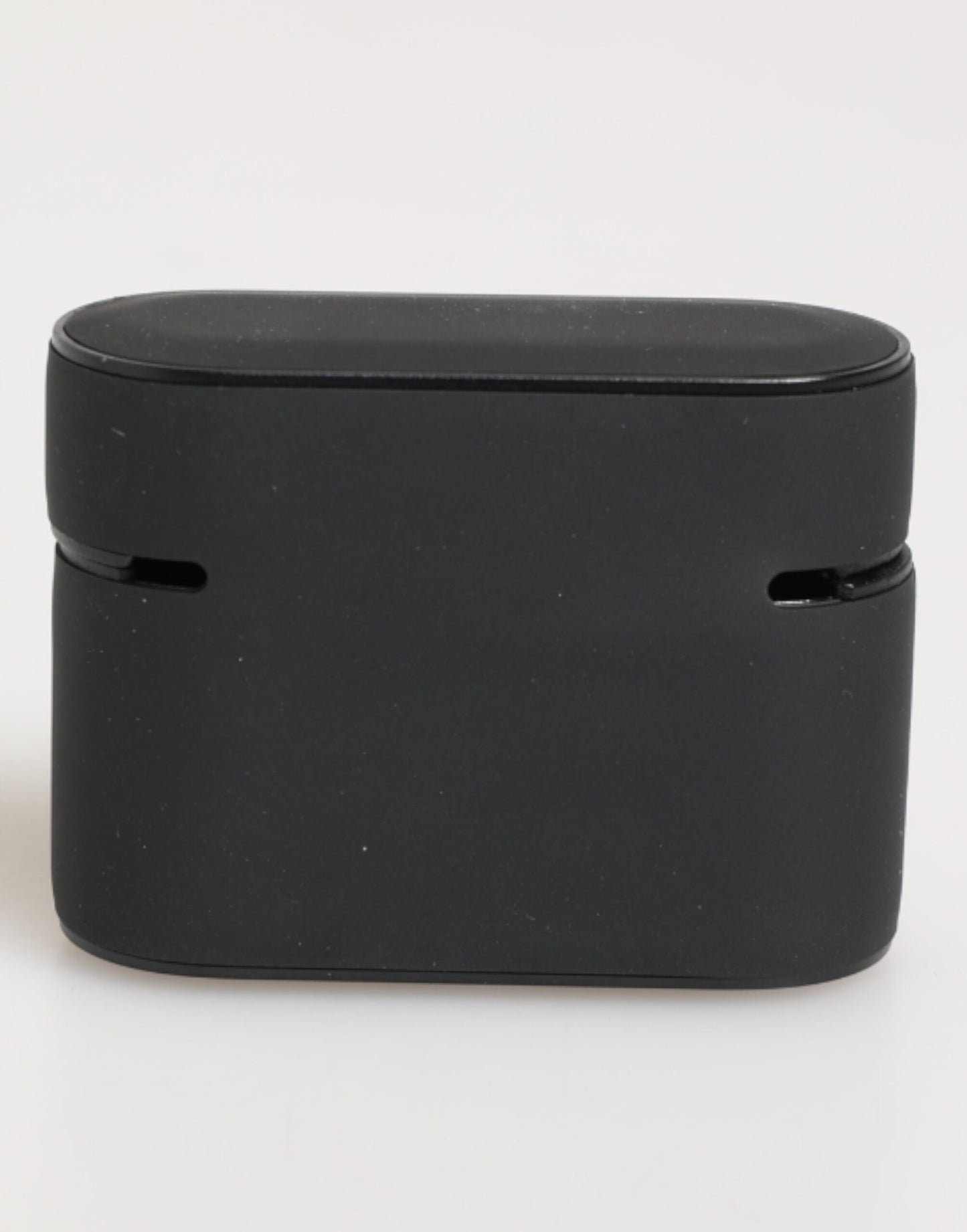 Étui Airpods Dolce &amp; Gabbana en caoutchouc noir et blanc avec logo embossé.