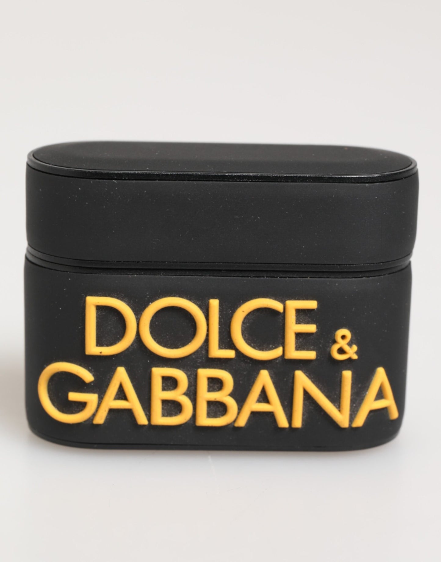 Étui Airpods en caoutchouc noir et jaune avec logo embossé de Dolce & Gabbana