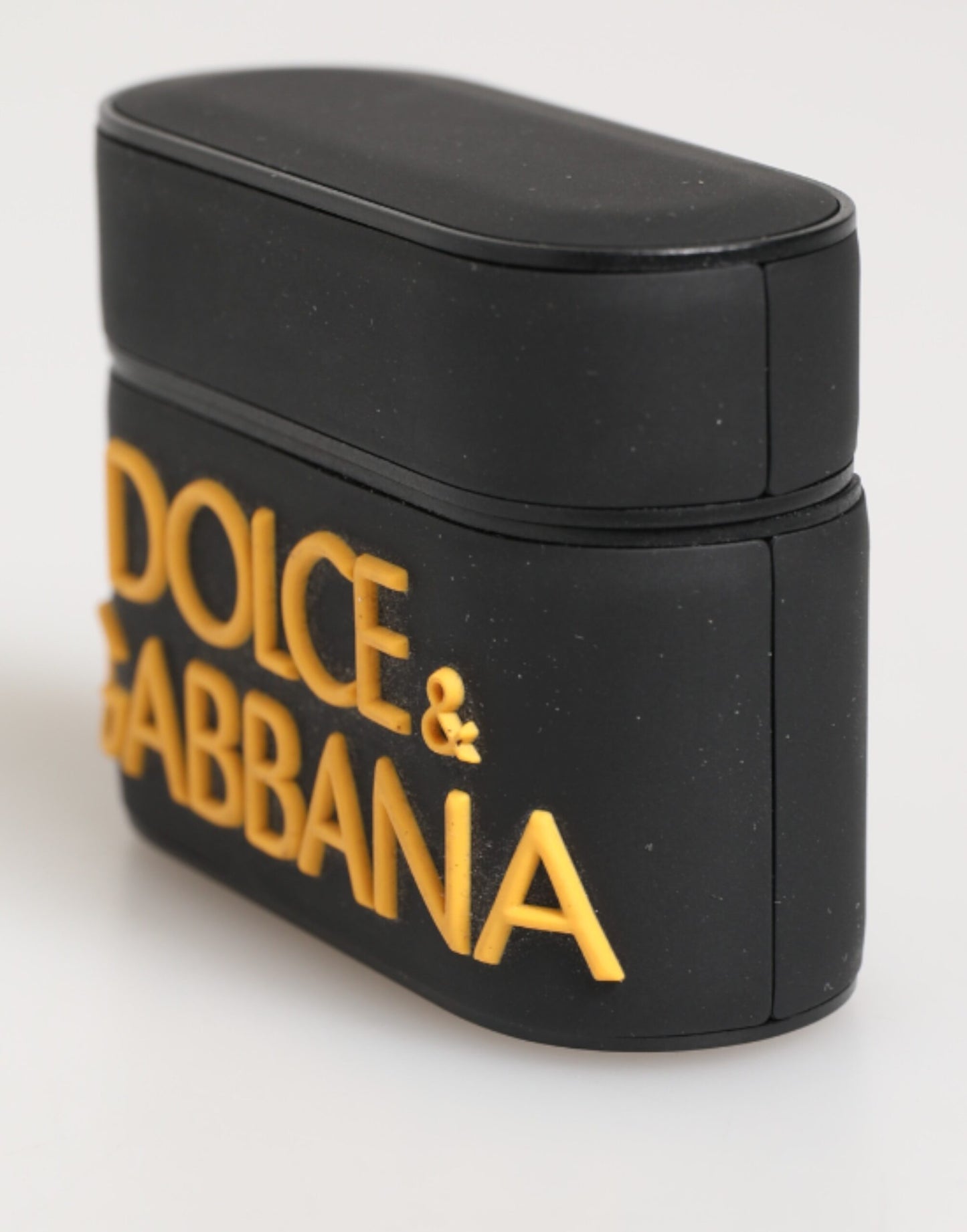 Étui Airpods en caoutchouc noir et jaune avec logo embossé de Dolce & Gabbana