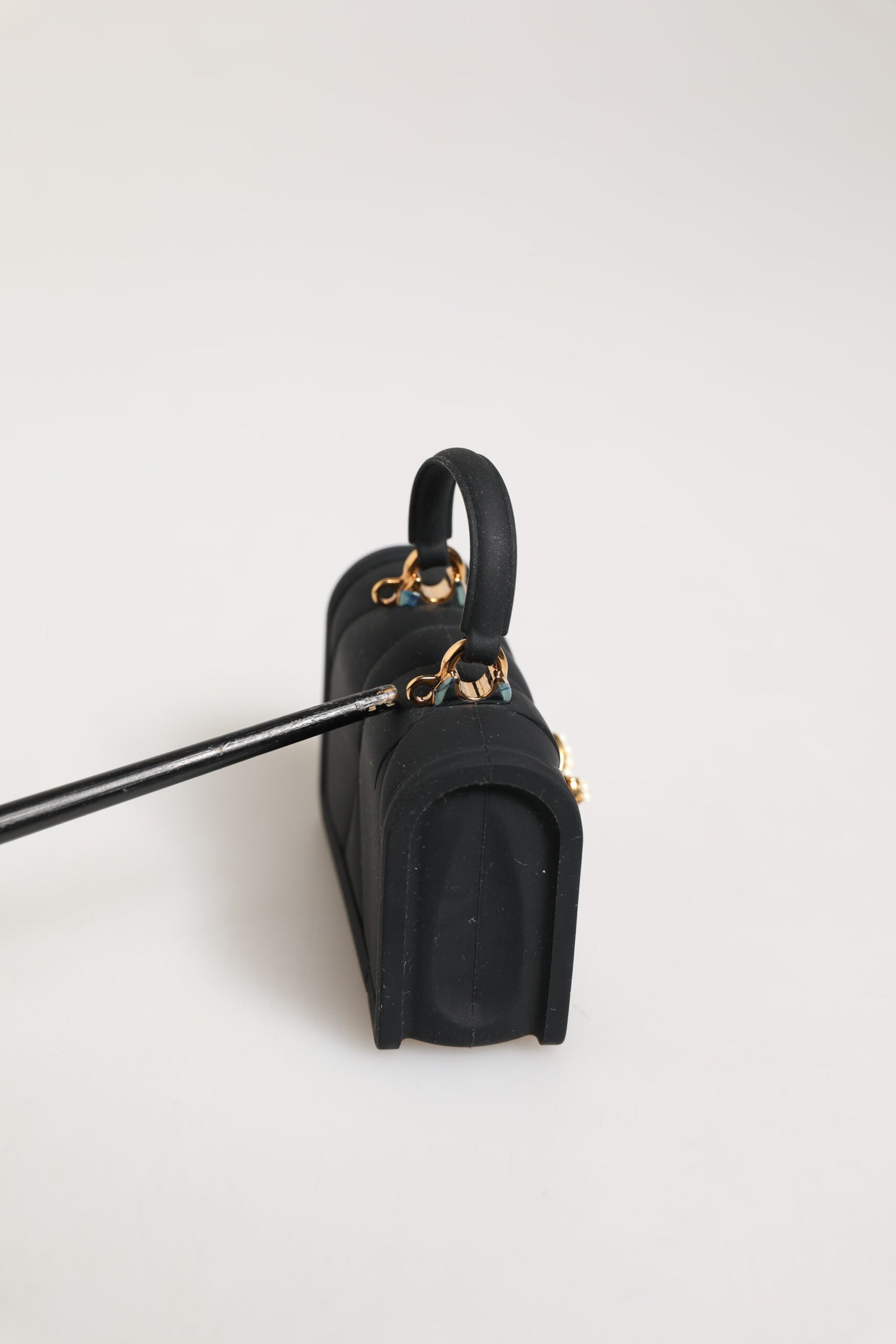 Étui pour Airpods Dolce & Gabbana en silicone noir avec motif cœur dévotionnel