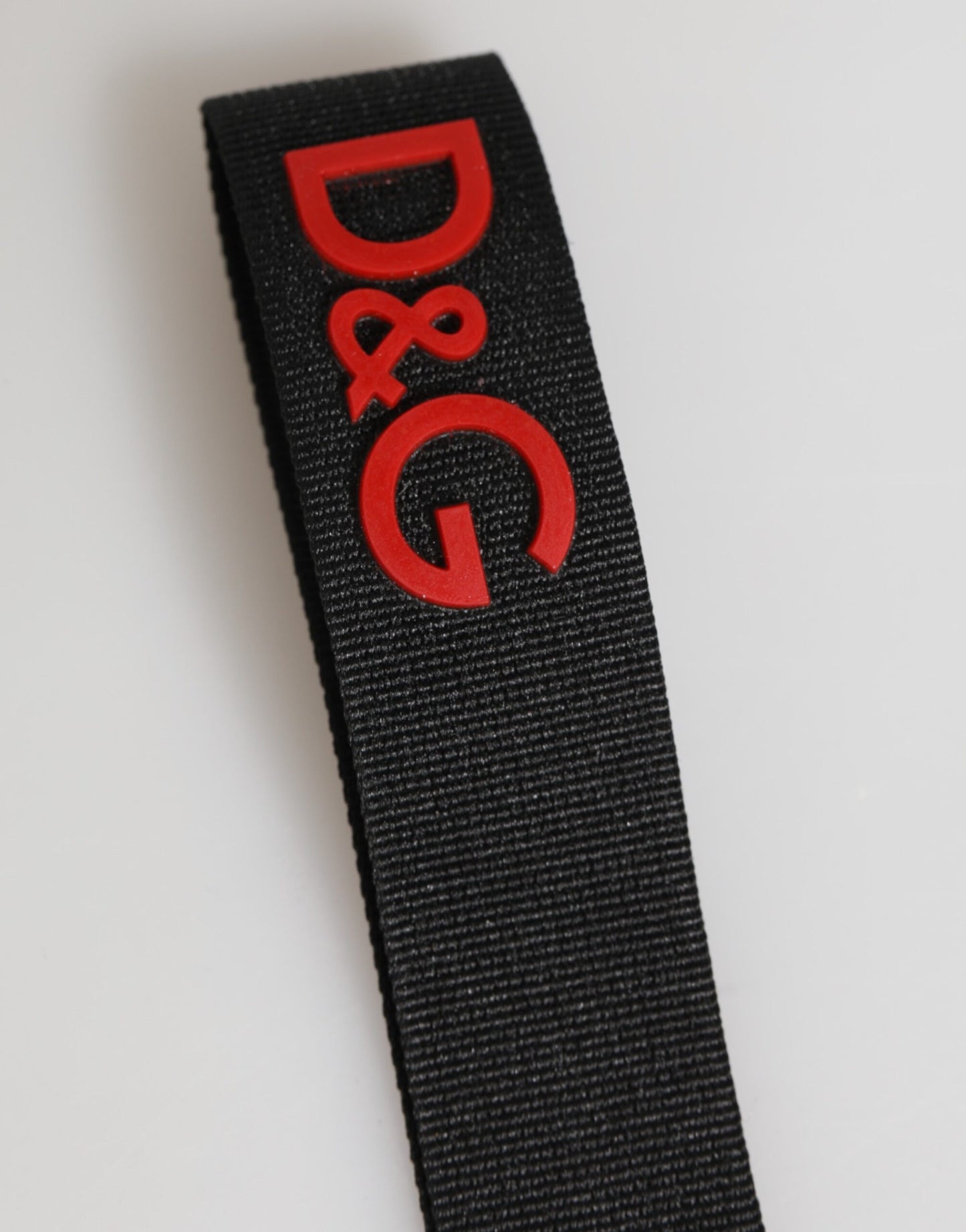 Porte-clés Dolce & Gabbana en polyester noir et rouge avec logo et porte-clés en laiton.