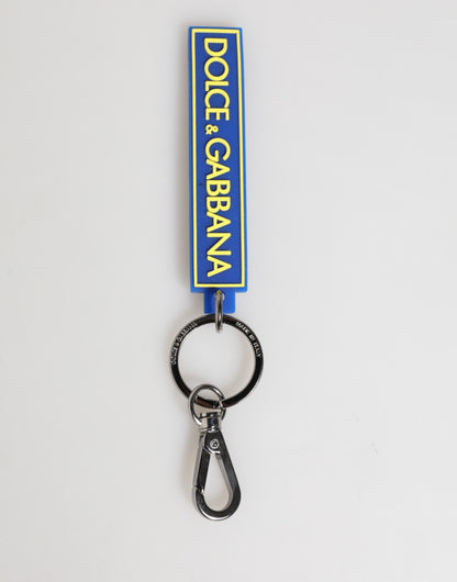 Porte-clés homme Dolce & Gabbana en caoutchouc, logo DG bleu et jaune, argenté.